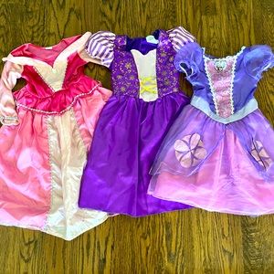 set of three little girl Disney and Disney-like dress up dresses